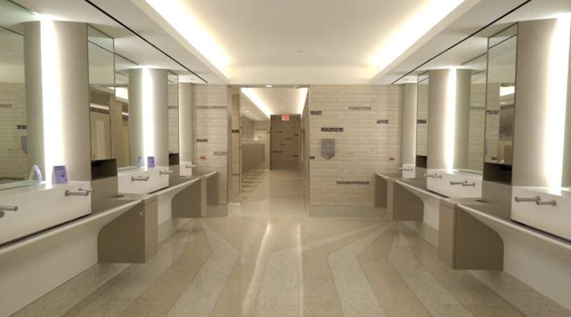 Commercial sensor faucets installed in modern airport terminal restroom